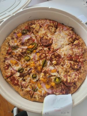 Half Georgia peach and half pepperoni at Plant Based Pizzeria in Atlanta