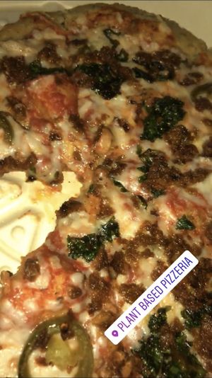 Beyond meat sausage/hamburger , kale, JALAPEÑOS AND FOLLOW YOUR HEART CHEESE at Plant Based Pizzeria in Atlanta