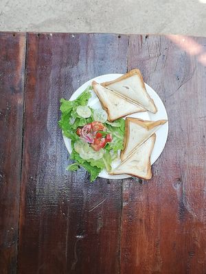 Toasts cheese tomatoes and moutarde at Man'Groove in Kep