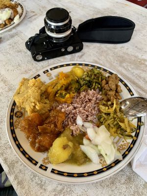 Red rice with everything! at Dhana's Curry Pot in Mirissa