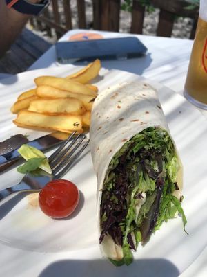 Delicious fries, with lettuce filled vegan wrap…….supposed to be vegetables salteado filling  at Tuká Tulá in Sao Miguel