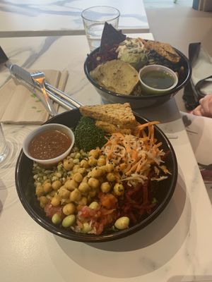 Asian Bowl with rice and tempeh (front) Aztec bowl with rice and tempeh (back) at Copper Branch in Nice