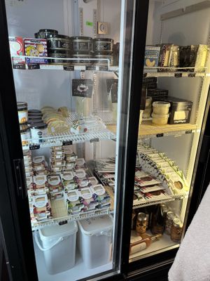 Refrigerated vegan cheese case  at La Fauxmagerie in North West London