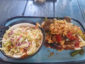 Brat on pretzel bread with extra slaw at 4th Street Fillin Station in Cocoa Beach