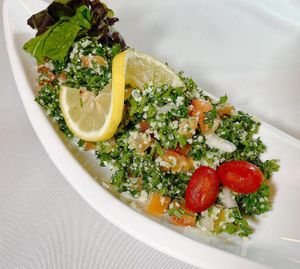 Tabouli Salad- chopped parsley, onions, tomatoes and olive oil. So goooood too! Green veges is a must!  at Shabestan in Central Singapore
