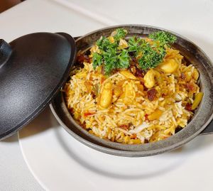 Veg Sabzi Polo - Bryani served in claypot, seasoned with Persian spices & herbs - love the presentation! Pretty! at Shabestan in Central Singapore