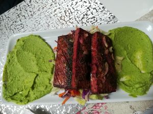 'Salmon' slices with salad and green pea puree at Magora in Vac