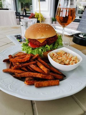 Vegan cheeseburger with sweet potato and coleslaw at Magora in Vac