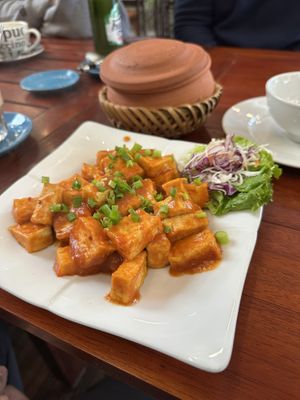 Tofu with tomato sauce and rice   at Coffee Station in Phong Nha