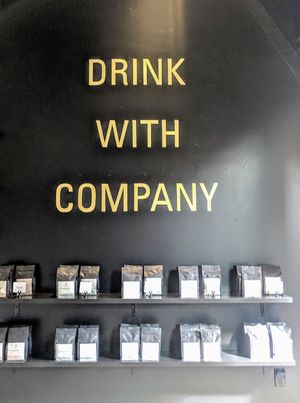 Drinking with company at WithCo Coffee in San Luis Obispo