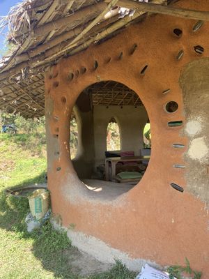 Earthbag house in a peaceful setting at Thai Zen Farm in Pai