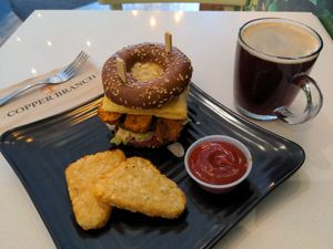 Ultimate Bagel Sandwich, combo with hash browns and Americano at Copper Branch in Thornhill