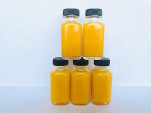 Orange Zinger Shots:  2 oz.  Orange, turmeric and ginger. at Glacier Juice and Wellness in Kalispell