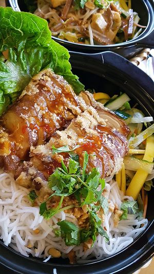 Crispy veggie duck with mango and tamarind sauce on rice noodles at Sunshine Vegan Restaurant in Berlin