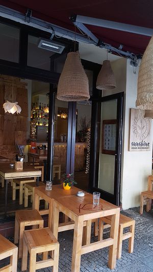 entrance of restaurant and seating at Sunshine Vegan Restaurant in Berlin