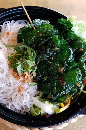 Bun tron la lot: Rice noodles with Lolot leaves filled with tofu, vegan beef and mushrooms, on rice noodles and tamarind sauce at Sunshine Vegan Restaurant in Berlin