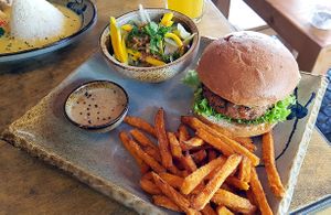 "Sunshine Hamburger" with pineapple and sweet potato fries at Sunshine Vegan Restaurant in Berlin