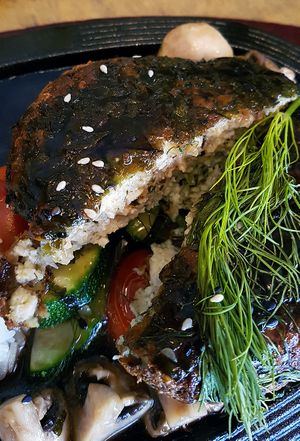 Fish imitation with Lolot leaf, dill, tomatoes and zucchini  at Sunshine Vegan Restaurant in Berlin