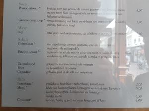 vegan options are clearly labelled with **:
 a pearl couscous dish and a vegan risotto at Grandcafé Hemels in Amersfoort
