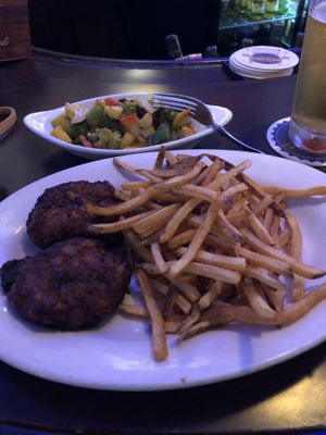 Plátano Empanadas with vegan cheese and black bean filling, side of fries, and vegetables  at Crazy Fox Bar & Grille in St Charles