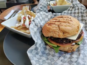 Burger with mushrooms, cheese, and a soy patty at Lavka in Guatemala City