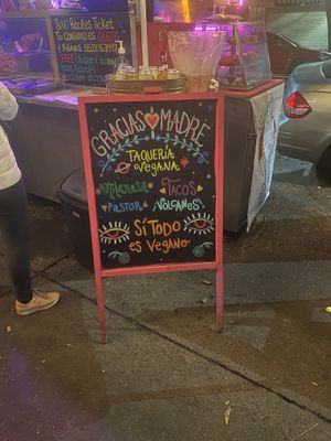 Menu/street signage at Gracias Madre in Mexico City