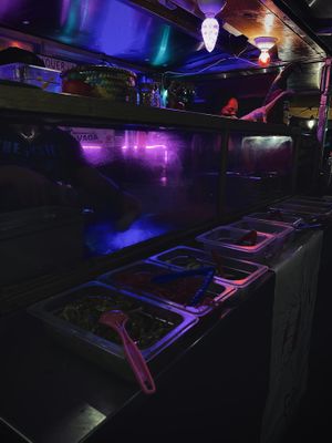 Whole lineup of unlimited fixins including black beans  at Gracias Madre in Mexico City