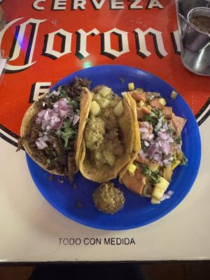 Tacos de arrachera, chicharrón en salsa verde, y piña al pastor  at Gracias Madre in Mexico City