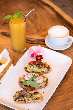 Avocado Toast 3-Ways
Sauteed mushrooms • Radish & baby arugula • Cherry tomato & basil

Vegan at Drift Bar in Santa Teresa