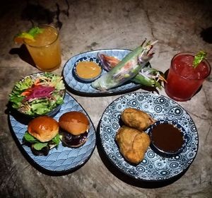 Sliders, fresh spring rolls and samosas at Drift Bar in Santa Teresa