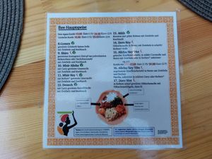 Mains with labelled vegan options at YEnat Restaurant in Mannheim