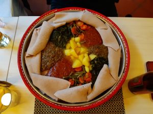 Injera plate "Tzom" for two with five different vegetable/ lentil/potato dishes at YEnat Restaurant in Mannheim
