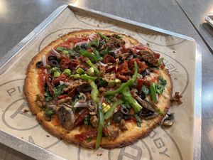 Veggie pizza with daiya cheese, crumbled veg meatball, and loads of veggies.   at Pieology - Tamuning in Guam