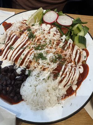 Enchilada made vegan (subbed vegan cheese and veggies)  at Hoja in Denver