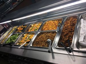 Tempeh tacos (slaw & vegan creama not shown), fiesta corn, zesty garbanzos, enchiladas, squash, broccoli, vegan curry and cilantro rice. at Adventist Health Garden Cafe in Portland