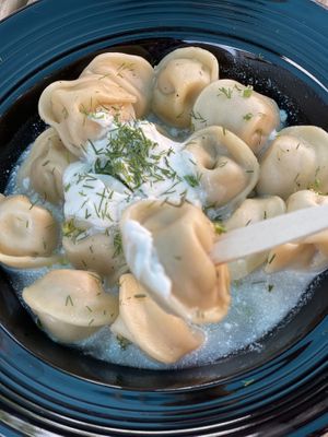 Vareniki with mushrooms and patotoes filling. Served with sour cream and fresh dill. at sPACYcLOUd Lounge in Washington