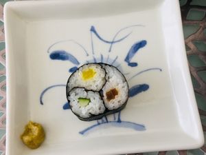Three small picked veg rolls inside one big roll at Washoku Home Cooking in Osaka