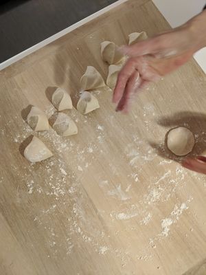 Shaping the dough at Washoku Home Cooking in Osaka
