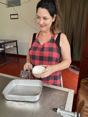 Ready to scrape the coconut to be used for the Sambol and curries  at Matey Hut in Ella