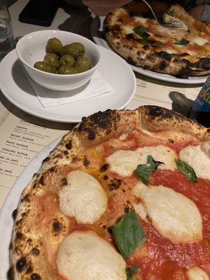 vegan margherita, warm olives at Trappa in Ljubljana