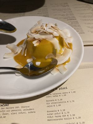 coconut dessert  with mango purée  at Trappa in Ljubljana