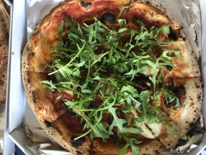 vegan pesto pizza take away at Trappa in Ljubljana