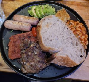 Vegan Breakfast - bread, sausage, square sausage, beans, tomatoes, avocado, black pudding, hash brown, haggis at William Cafe in Glasgow