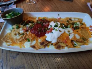 Starter; tortillachips with vegan cheese at Slot Oostende in Goes
