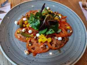 Starter tomato carpaccio. Order without goat cheese at Slot Oostende in Goes