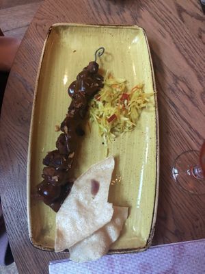 Vegan sate with homemade atjar tjampoer and a vegan satesauce. It is served with fries. at Slot Oostende in Goes