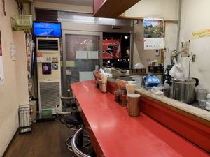 Restaurant seating at Tokkyu Ramen in Kyoto