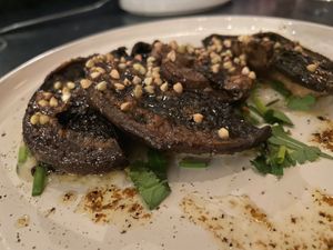 Roasted portobello mushroom - miso butter - yacon creme - green herbs at Camion in Antwerpen