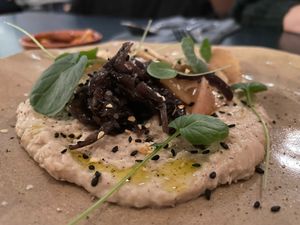 Lima bean dip - roasted turnips - caramelized onion - black sesame - smoked garlic  at Camion in Antwerpen