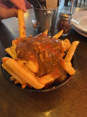 Vegan poutine (unfortunately bland - gravy had no flavour)   at Fat Badgers Pizza Bar in Queenstown